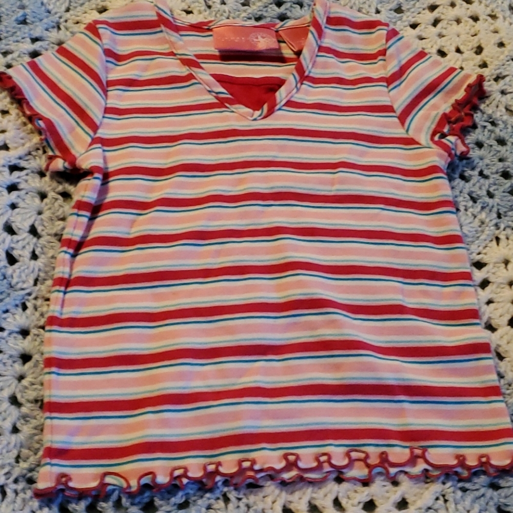Pink, red, blue, and white striped shirt.